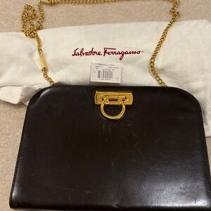 Salvatore Ferragamo Black Bag with Gold Accents and dust bag. Check pictures